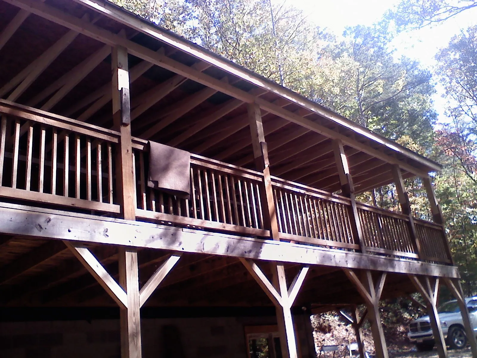 Timber framing under a new elevated porch and deck — Roof Leak Repair in Madill by Roofing Brothers